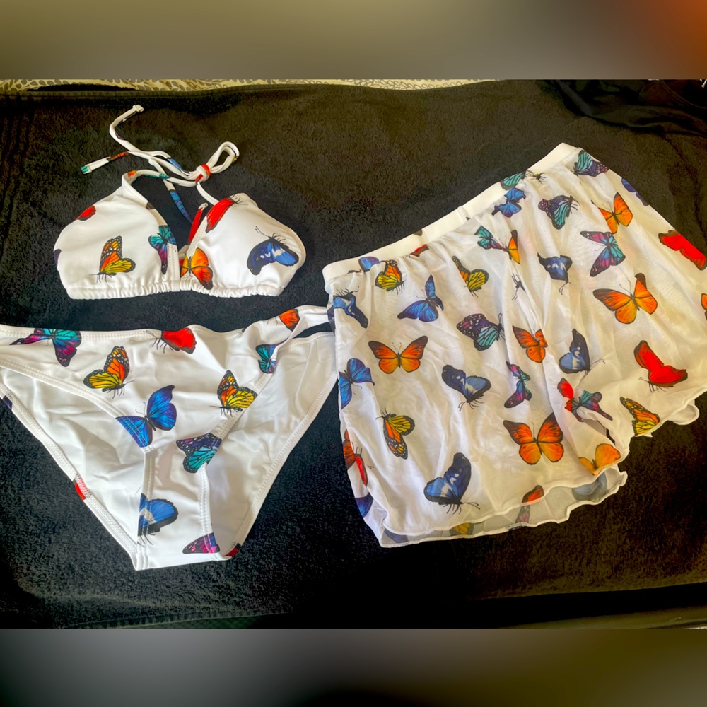Brand new. 3 piece swimsuit